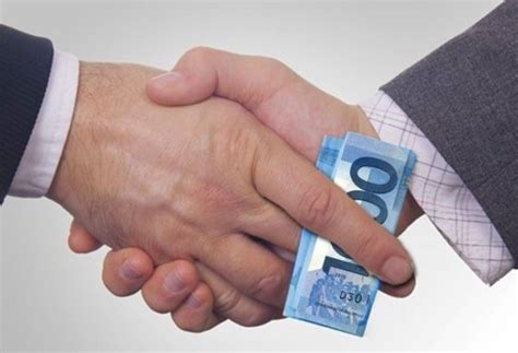 NLRC official denies corruption claims .